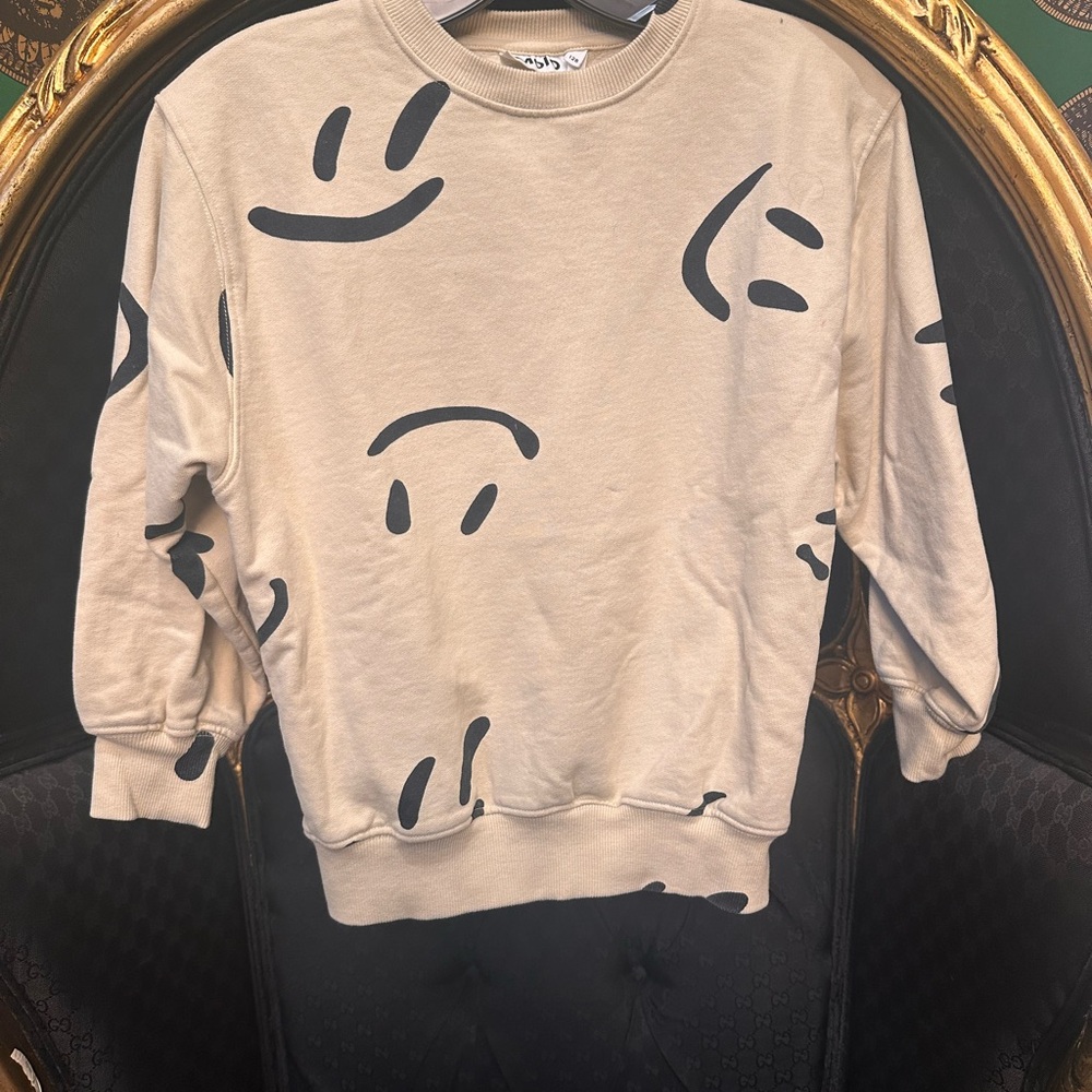 Molo Beige Crewneck Sweater with Black Smiley Design